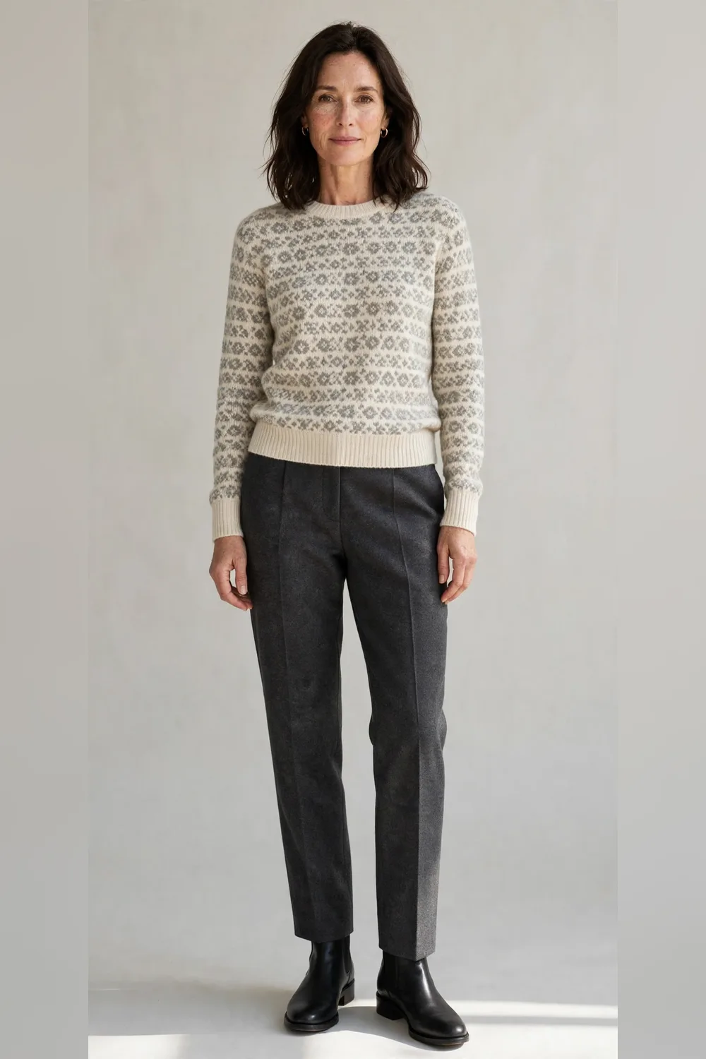 Charcoal trousers with a subtle fair-isle knit and ankle boots for Christmas dinner
