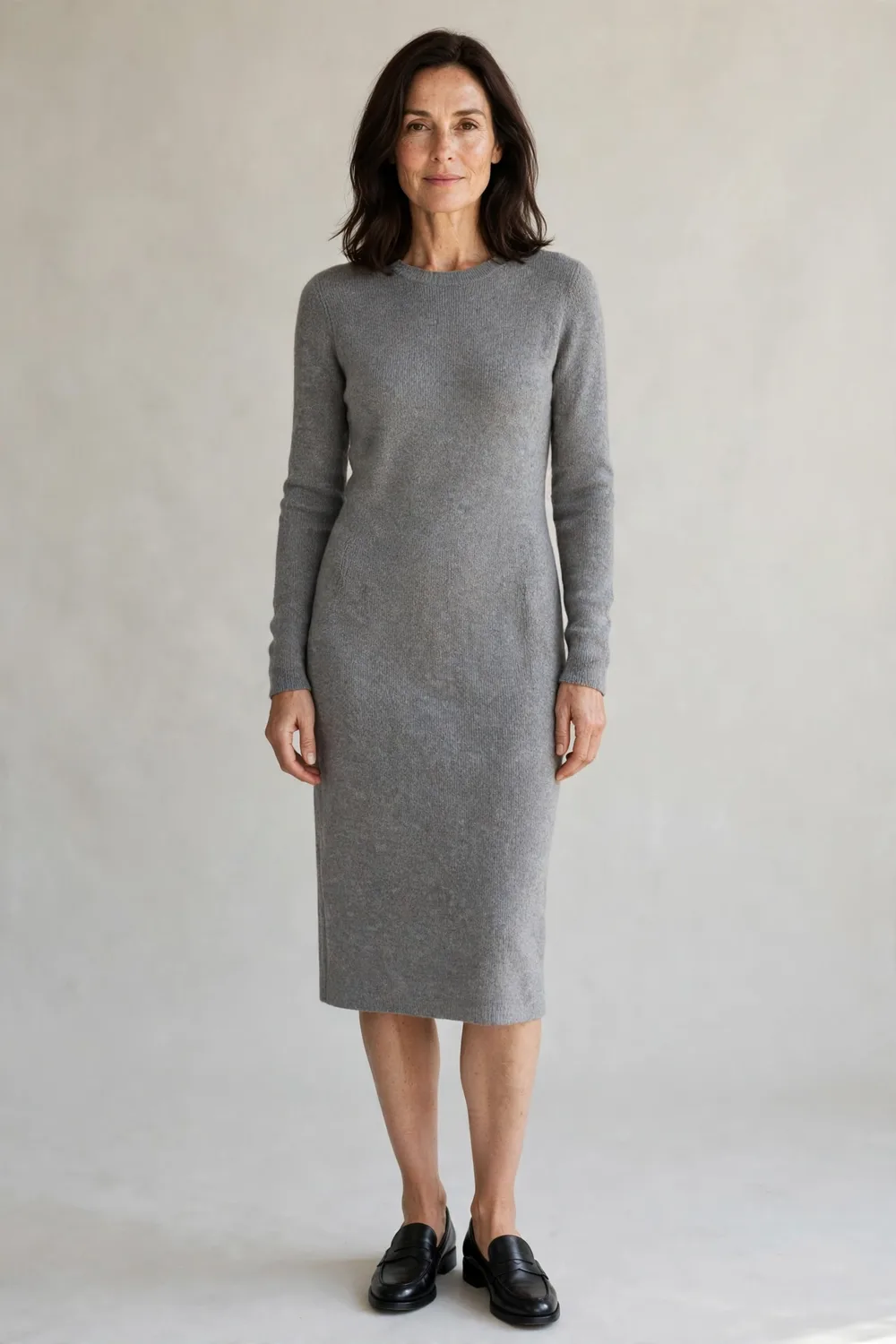Grey merino dress with black loafers for an office Christmas party