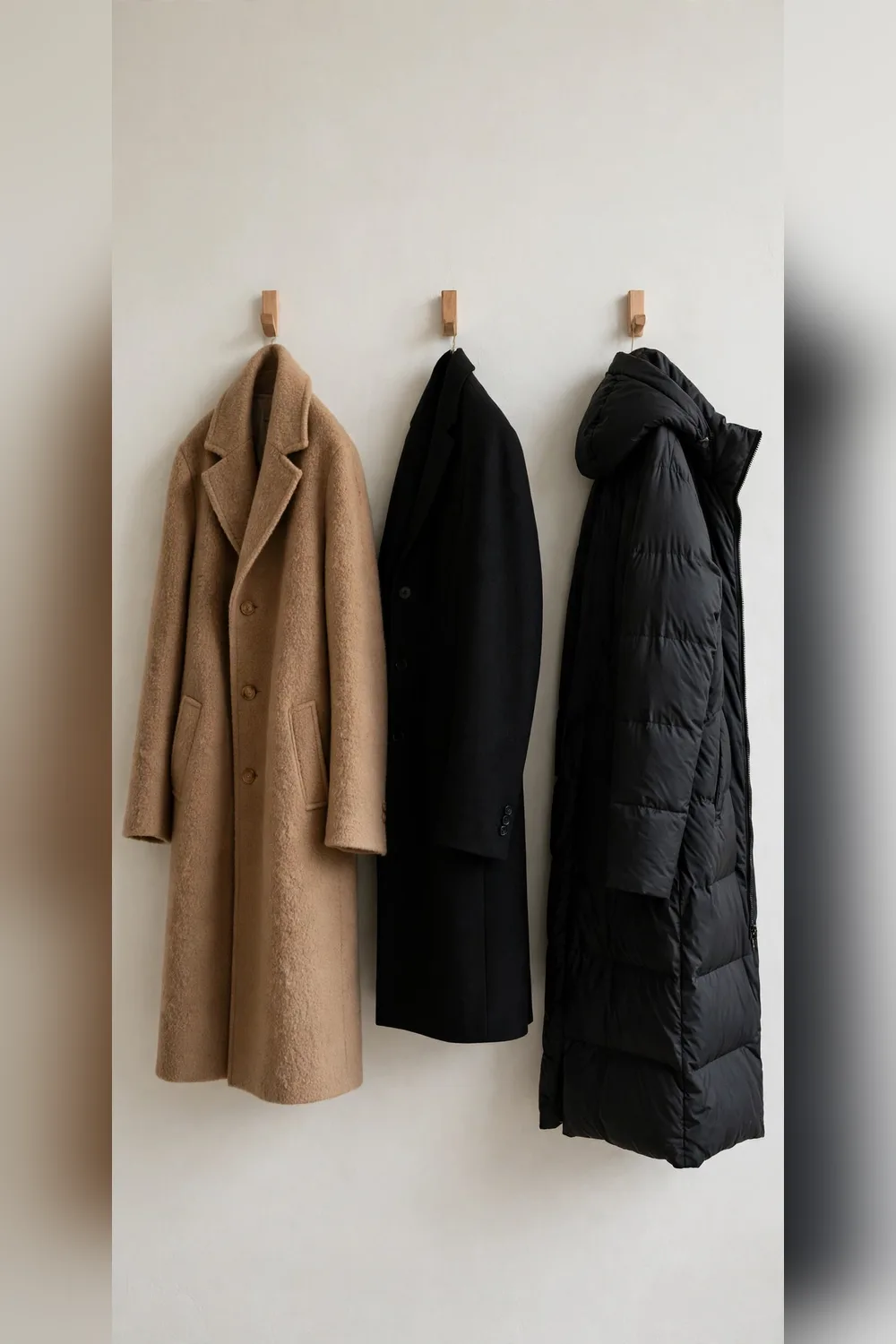Winter capsule wardrobe coat lineup camel wool coat black coat and puffer