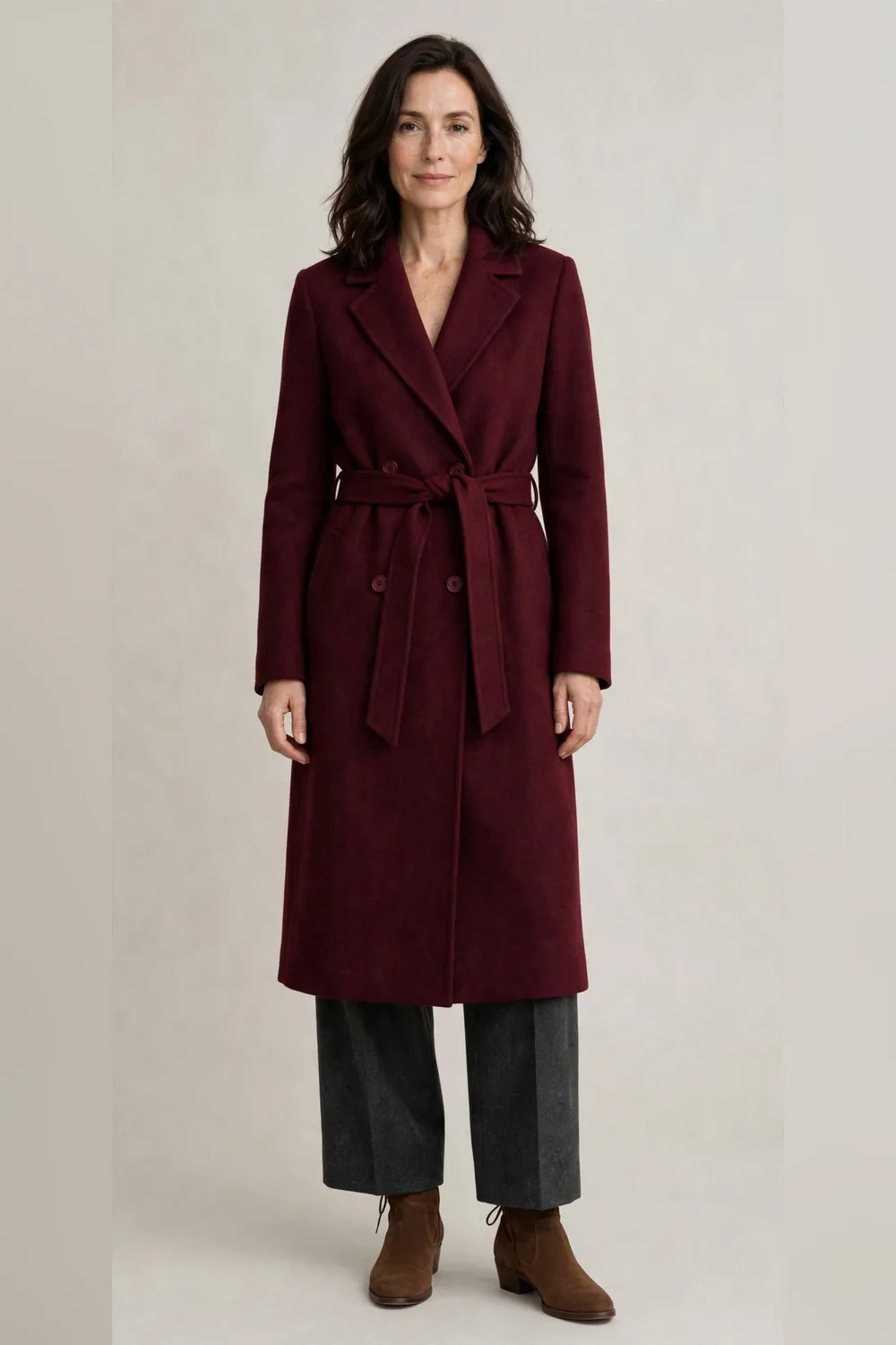 Burgundy wool coat with charcoal trousers and brown ankle boots