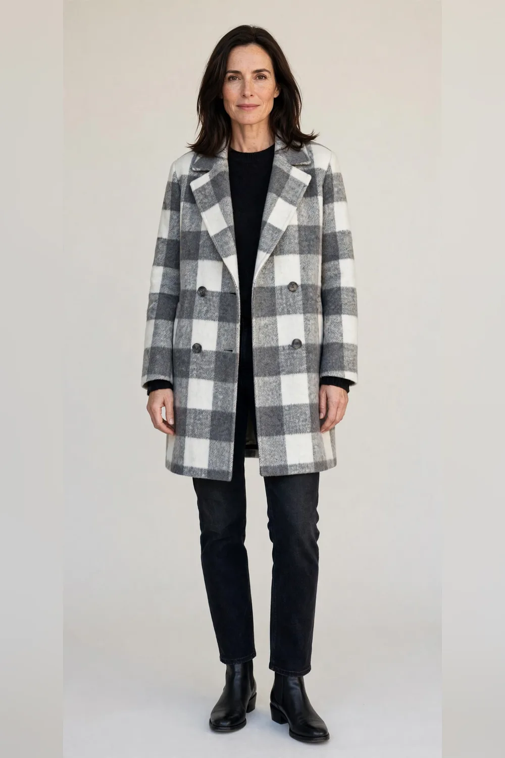 Grey check wool coat with dark straight jeans and black boots